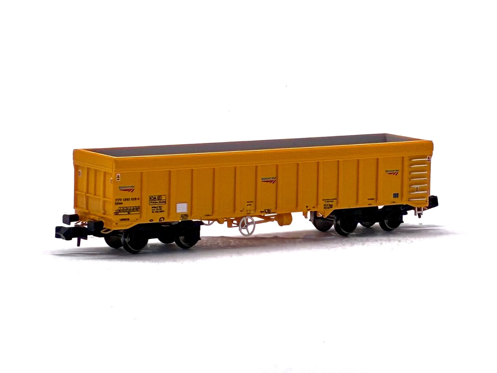Dapol 2F-045-008 IOA 'Merlin' bogie ballast wagon in Network Rail yellow