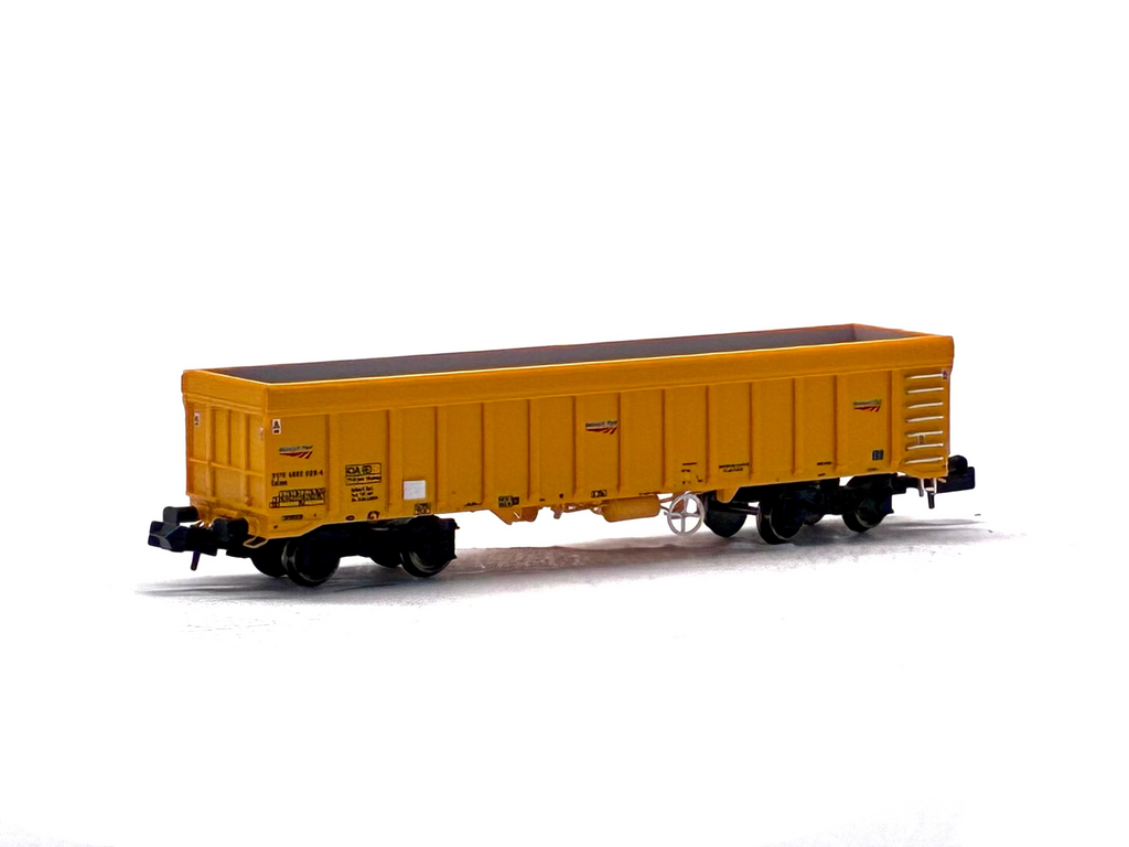 Dapol 2F-045-008 IOA 'Merlin' bogie ballast wagon in Network Rail yellow