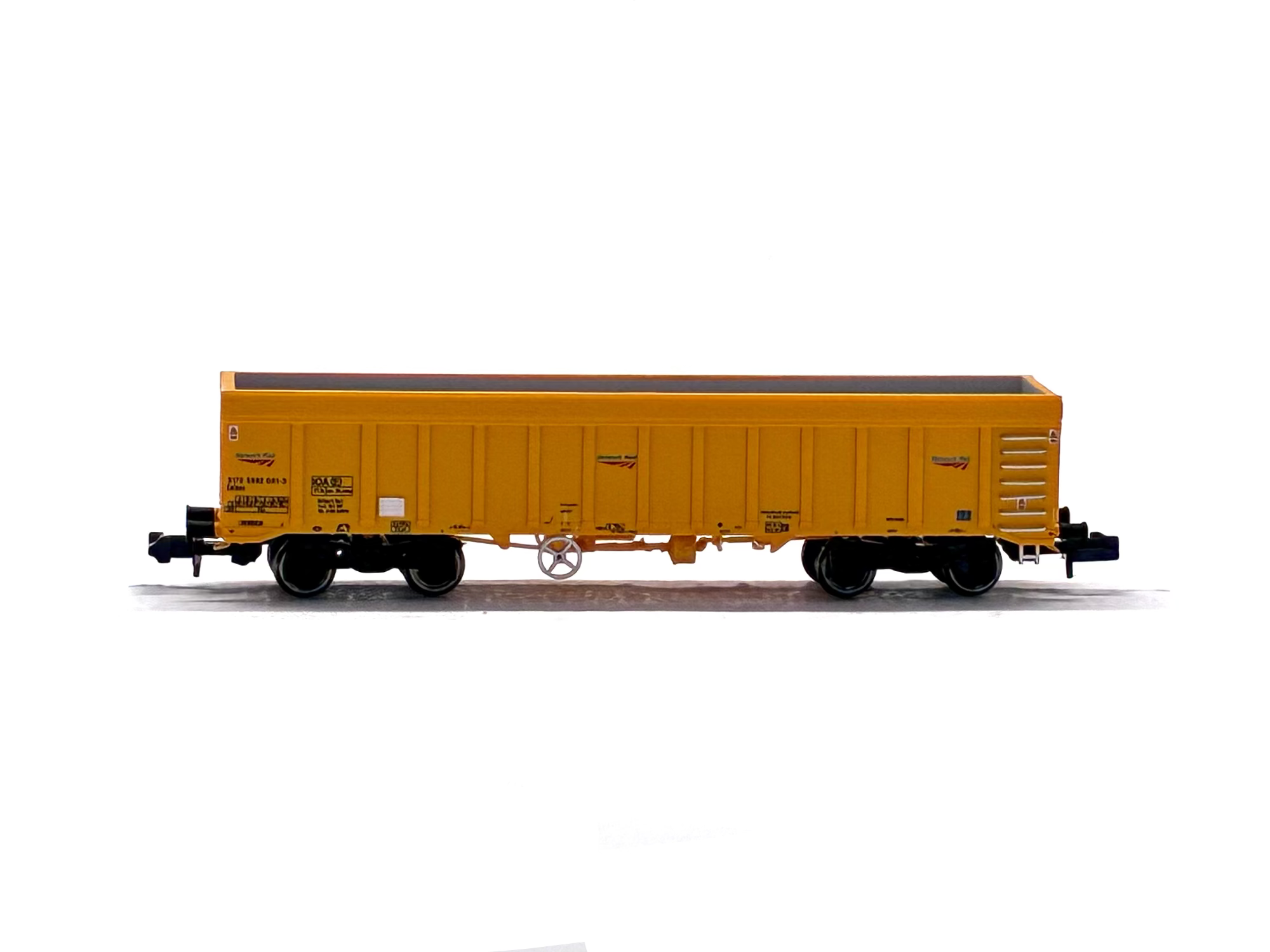 Dapol 2F-045-005 IOA 'Merlin' bogie ballast wagon in Network Rail yellow