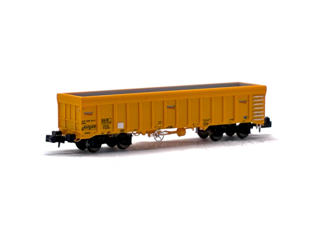 Dapol 2F-045-001 IOA 'Merlin' bogie ballast wagon in Network Rail yellow