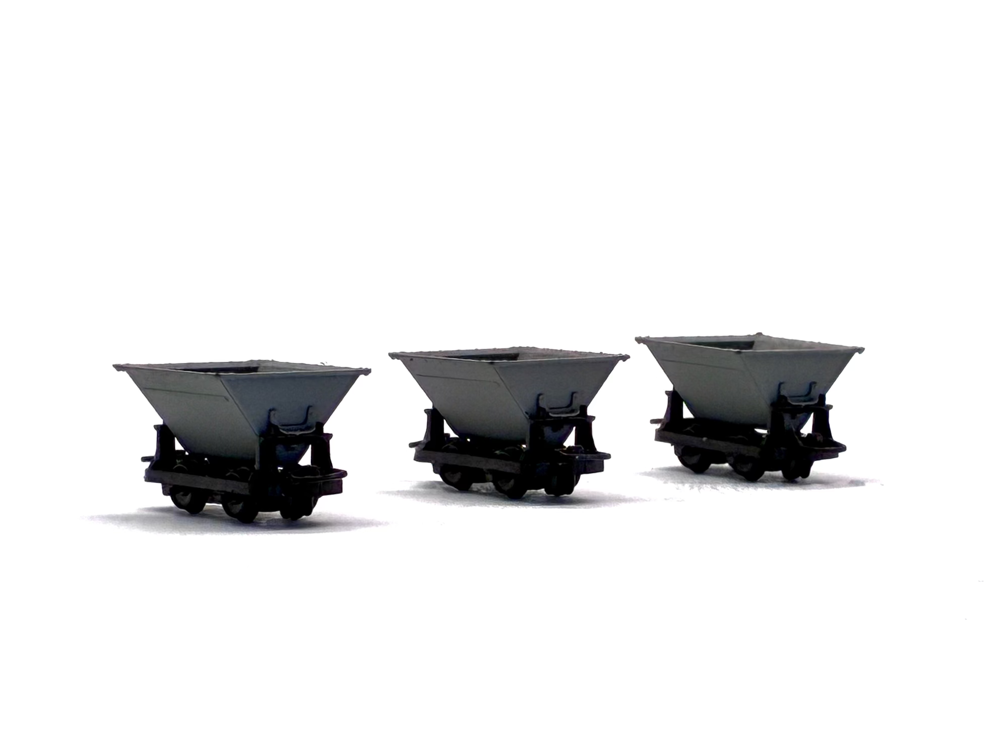 Peco Products GR-331 Pack of three 4-wheel narrow gauge "Rugga" hopper wagons in grey