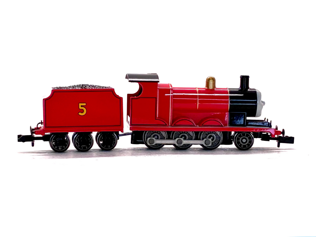 James steam locomotive train with a matching red coal tender, photographed against a plain white background.