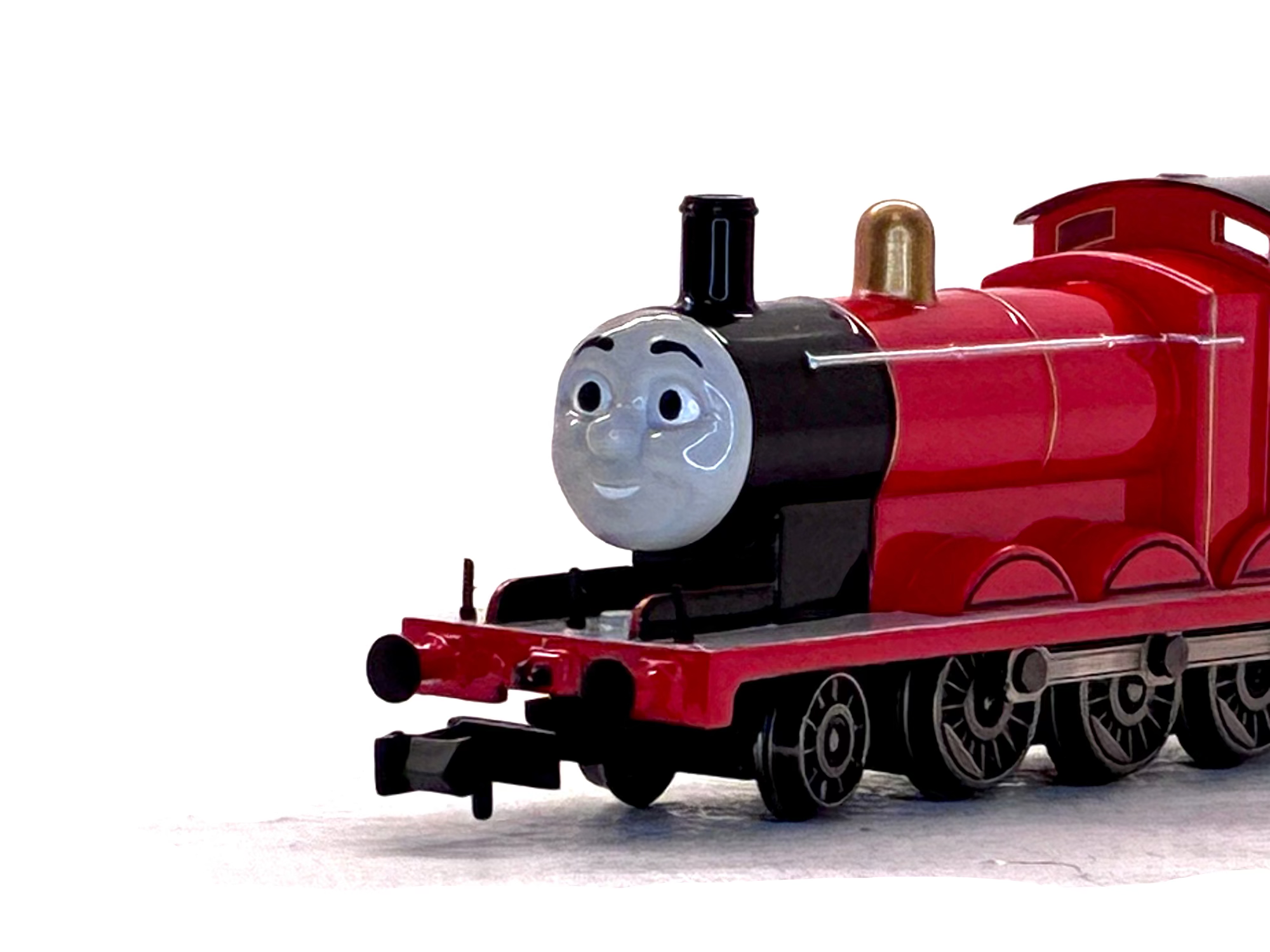 James model train engine with a gray face and black details, photographed on a plain white background.