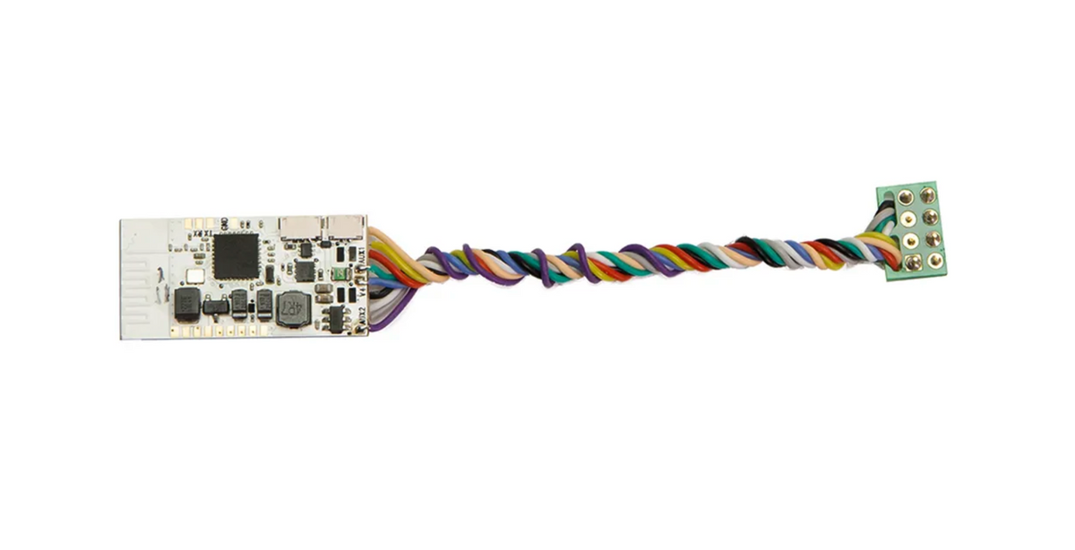 A multi-pin electronic connector cable with a white printed circuit board on one end and a twisted bundle of multicolored wires on the other, isolated on a white background.