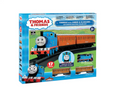 Thomas with Annie & Clarabel OO Gauge Electric Train Set in its retail packaging, featuring a blue steam locomotive and orange passenger carriages on a green illustrated track background.