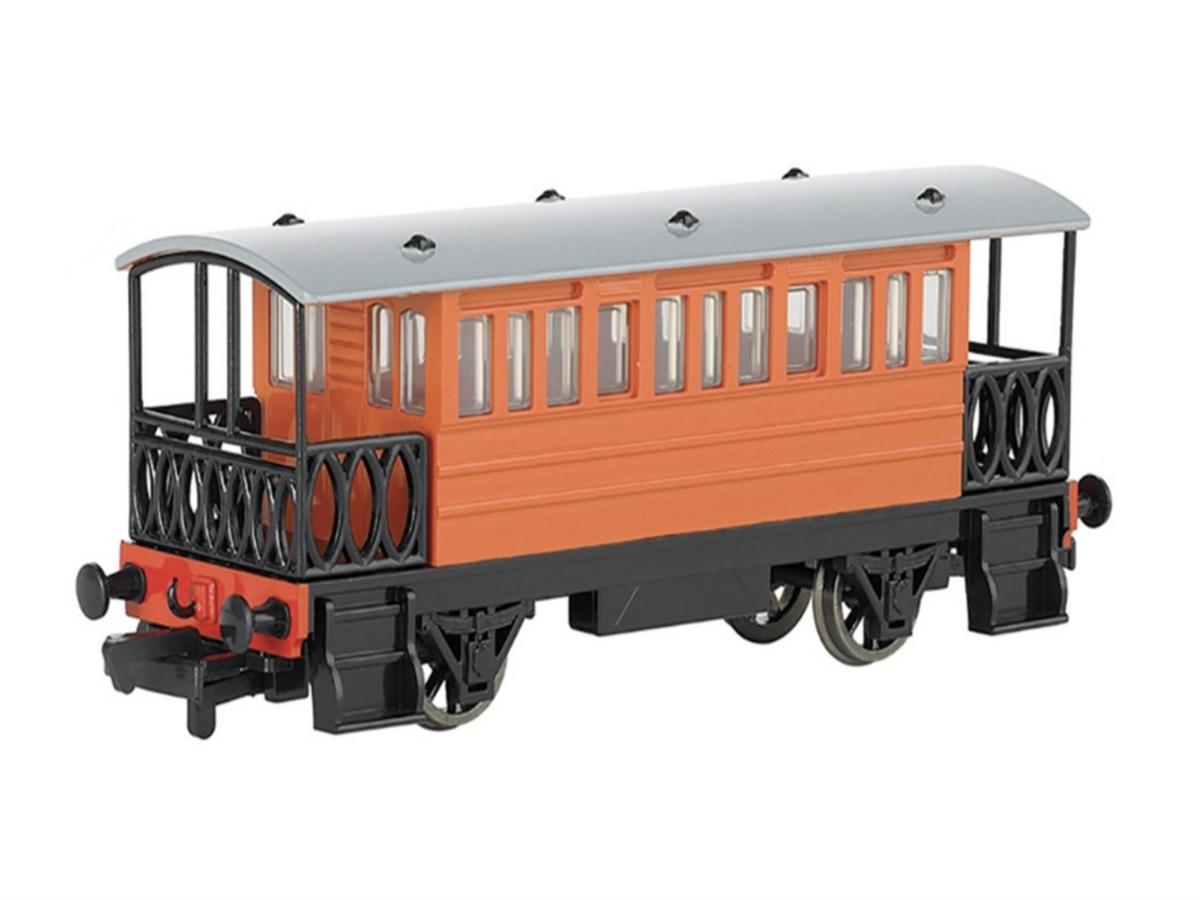 Henrietta a classic orange passenger carriage with a gray roof, black undercarriage and railings, and red front detailing, shown on a plain white background.